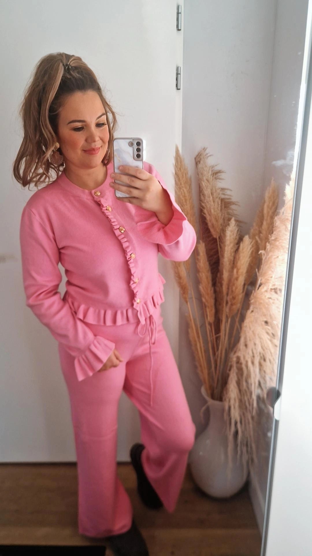 Top roezel goude knoop