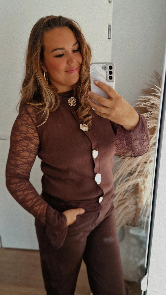 Gilet goude knoop