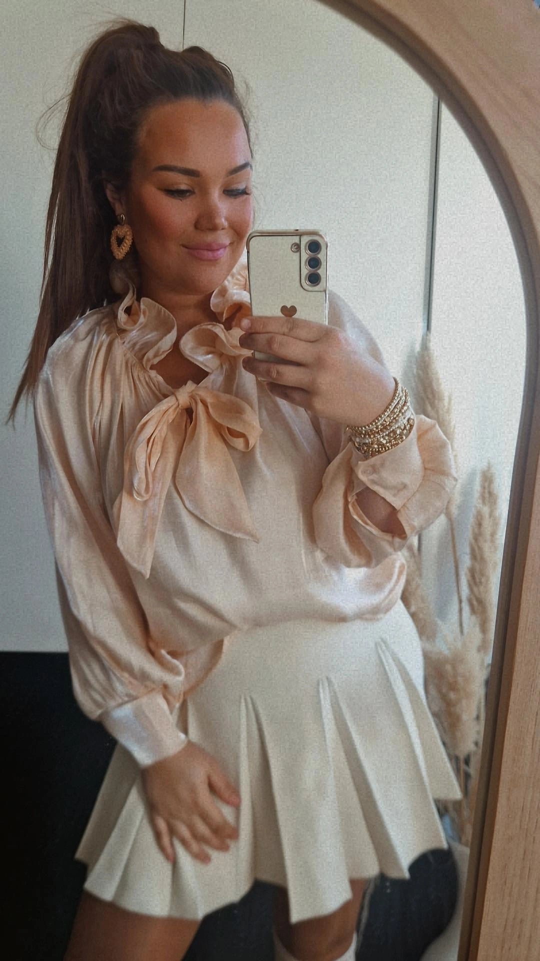 Blouse strik peach