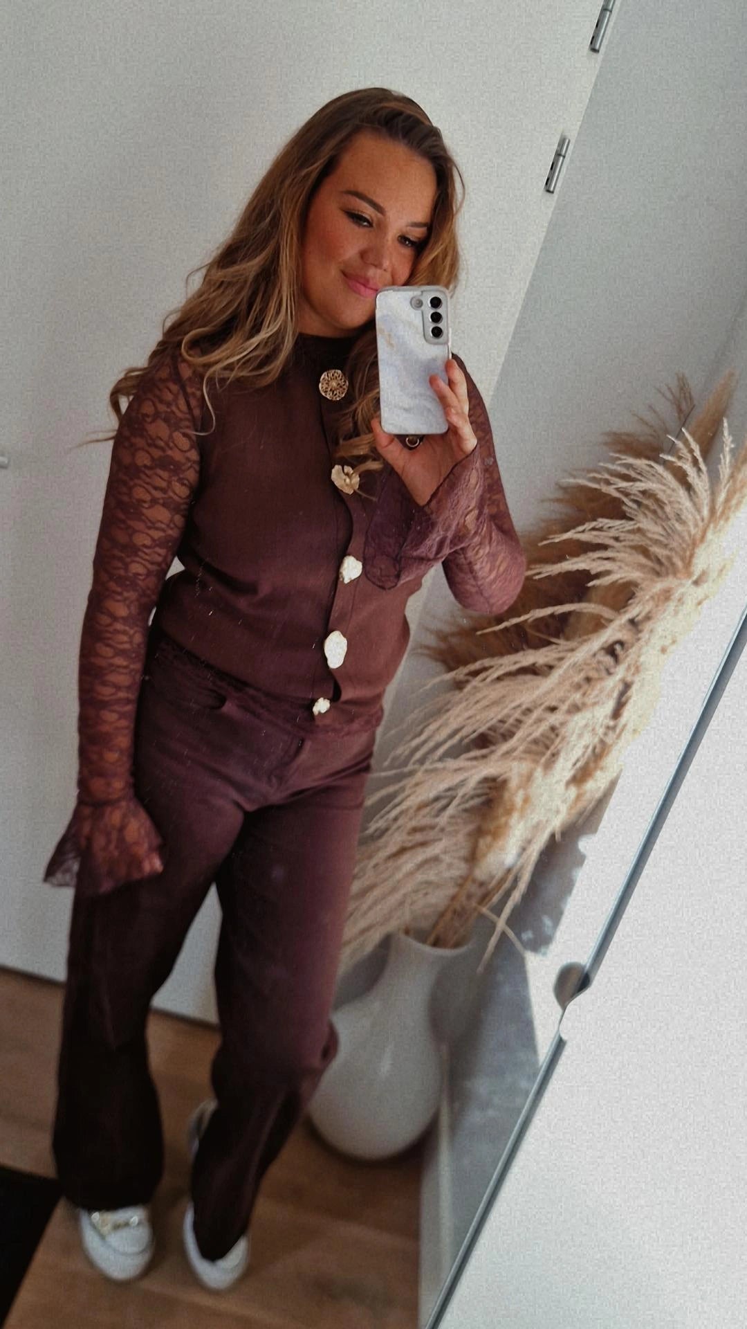 Gilet goude knoop